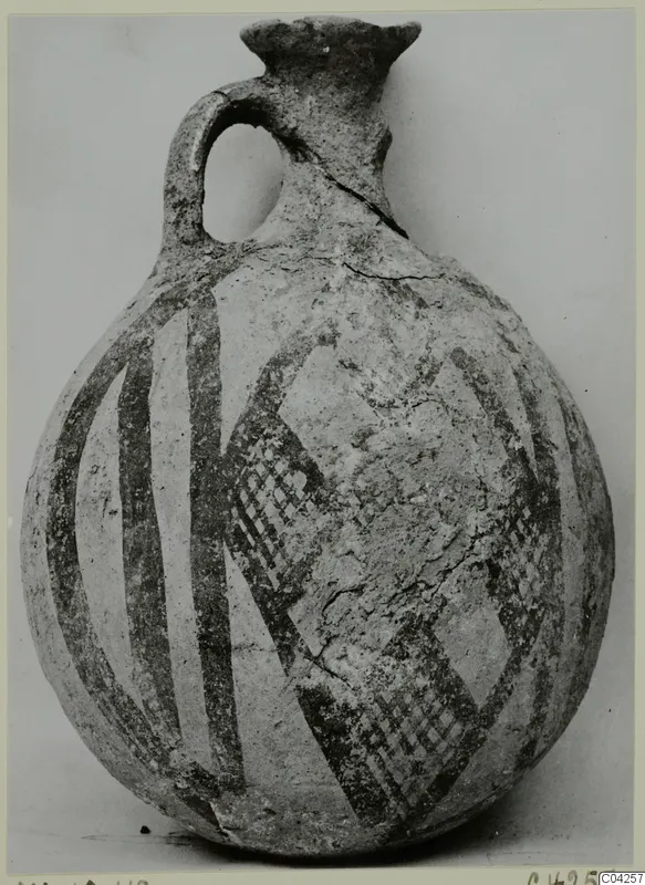 Pottery White Painted IV-V jug from Milia, round body with dark painted bands and checkered panels