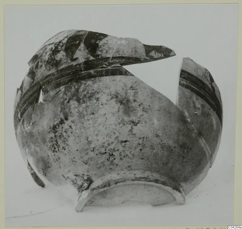 Pottery Bichrome Wheel-made vessel, broken open, with dark painted bands and a triangular pattern on the shoulder