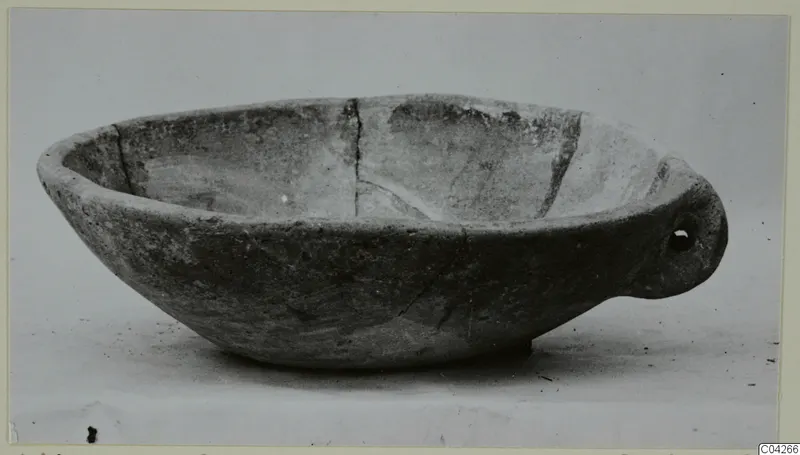 Shallow bowl with a pierced lug handle from Milia, Pottery Plain White Wheel-made