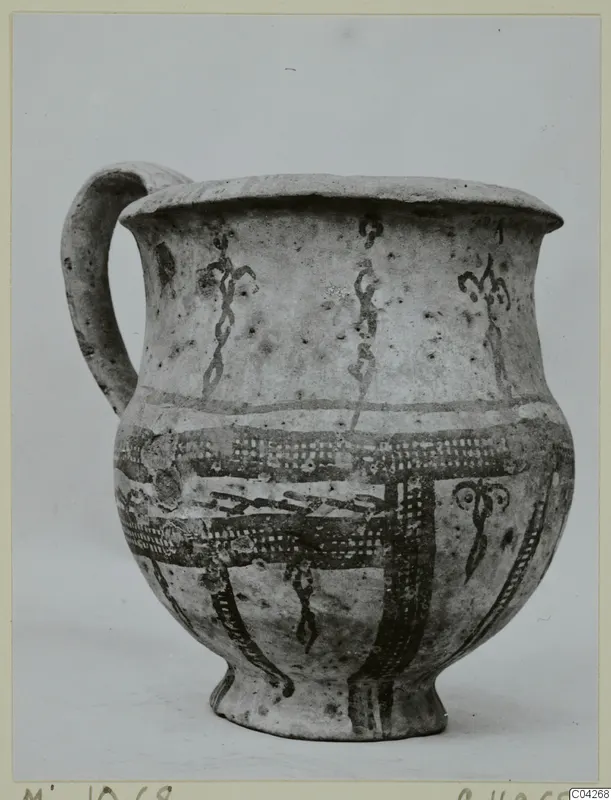 Jug with a single loop handle and dark painted bands on a pale slip, from Milia