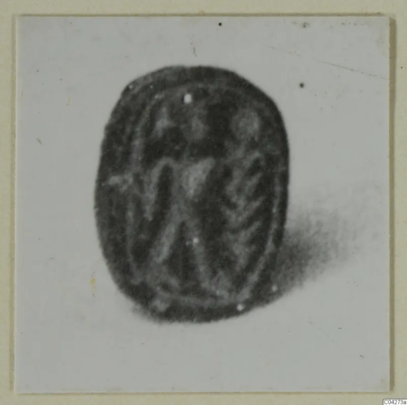 Scarab-shaped seal or gem from Amathus, photographed face on with an engraved pattern