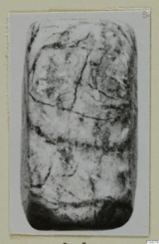 Barrel-shaped object with incised pattern lines, photographed from Amathus