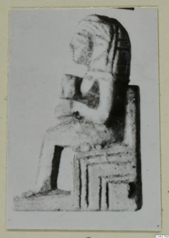 Seated statue from Amathus, shown in a photograph mounted on a card