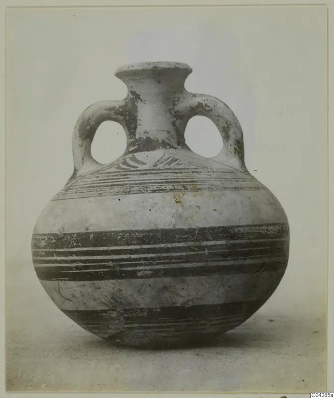 Round-bodied jar with two loop handles and a short flared neck, painted with horizontal dark bands.