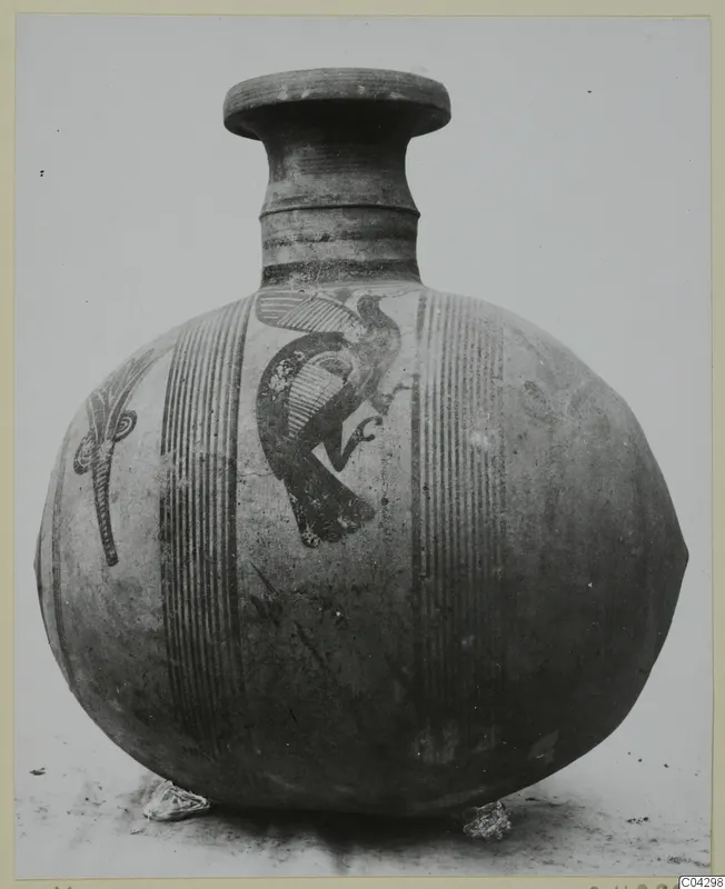 Round-bodied painted jug with a flat-topped neck, banded vertical stripes and a black bird motif on its shoulder.