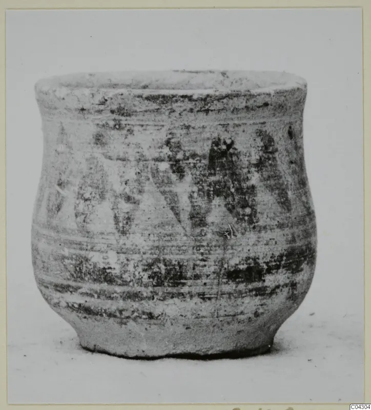 White Painted VII pottery vessel with dark painted decoration on the body