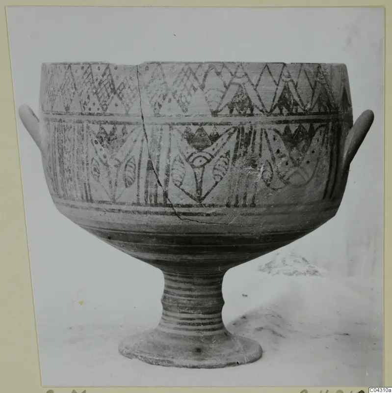 Pottery Bichrome IV bowl on a tall ribbed foot, with two small handles and bands of painted pattern