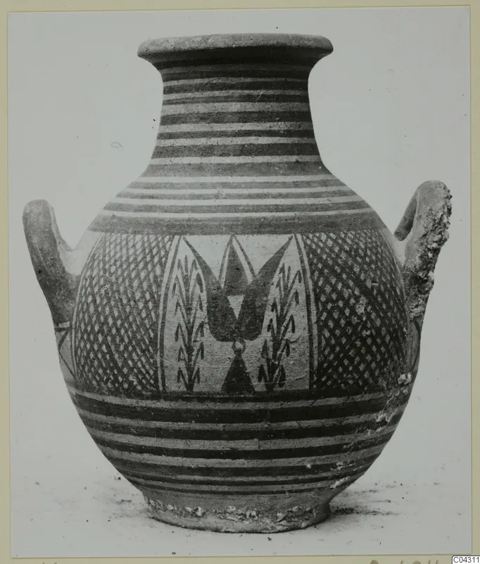 Two-handled painted pottery jar with banded neck, lattice panels and a central motif on the body.