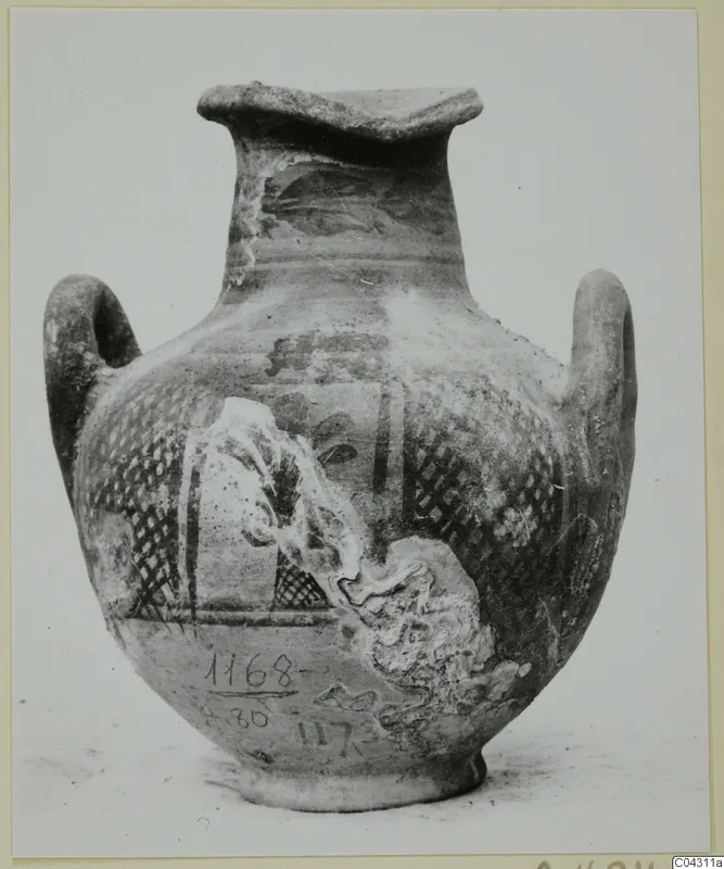 Two-handled painted pottery vessel with lattice-patterned bands and a framed panel, photographed against a pale background.