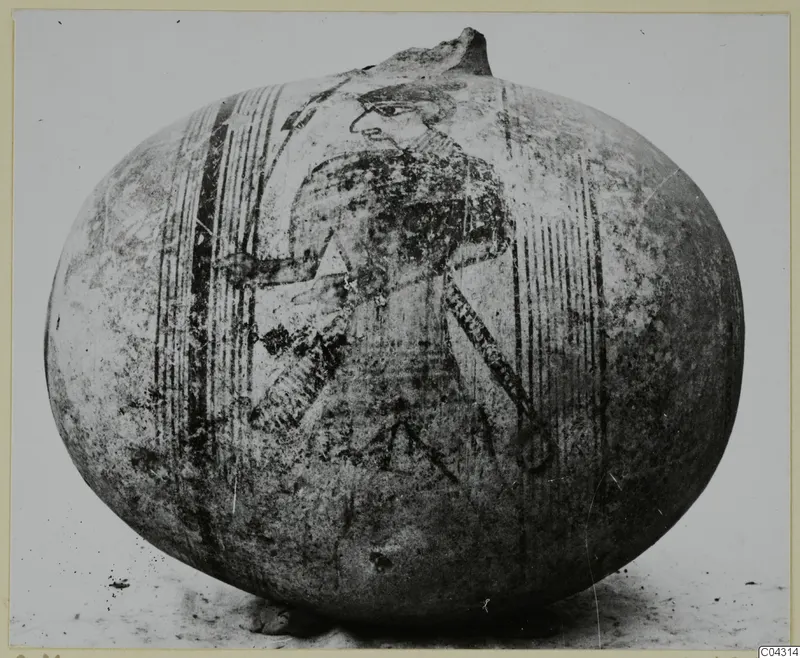 Globular jug with a painted human figure between vertical bands, photographed from the side.