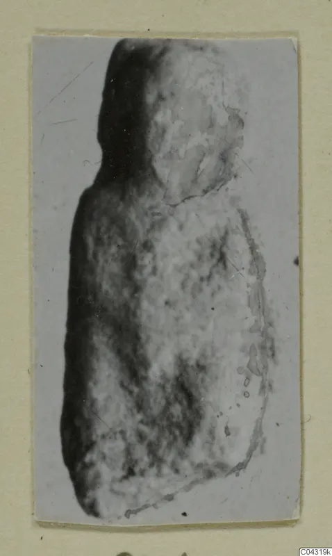Weathered stone figure fragment from Amathus with a rounded head and broad body, shown in a small print