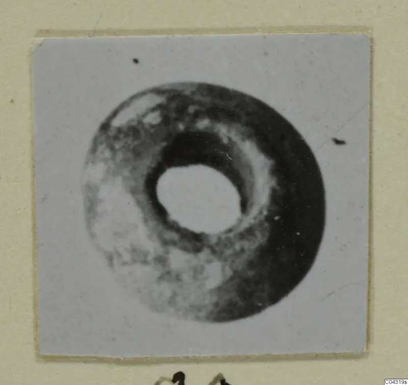 Ring-shaped stone object with a central hole, from Amathus