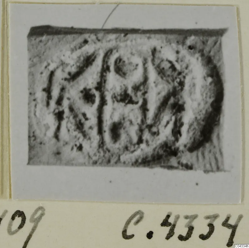 Glyptic find from Ayia Irini: a small rectangular seal or gem with an engraved design, photographed close up
