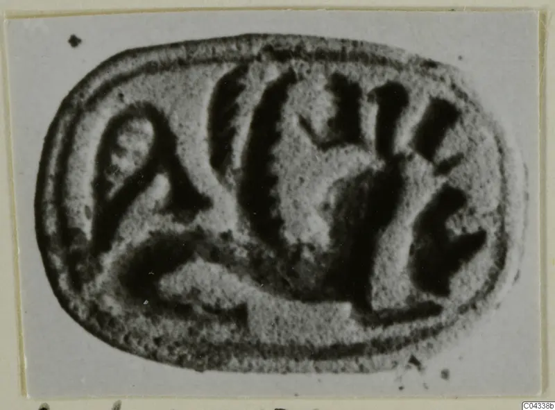 Oval seal-stone with incised signs on its flat face, from Ayia Irini