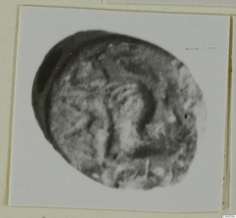 Glyptic find from Ayia Irini: a small oval carved object seen close up