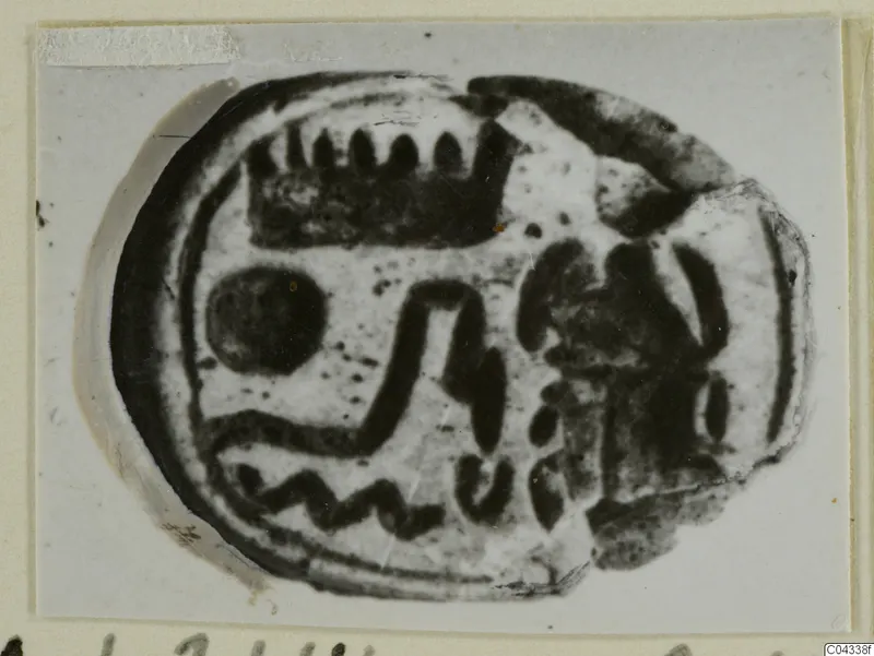 Oval seal from Ayia Irini with a dark engraved design on its flat base