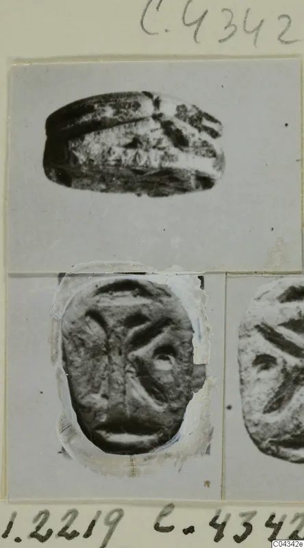 Stone seal shown in two views: domed back with ridged lines, and flat engraved base, mounted on a card with a partial second seal at right.