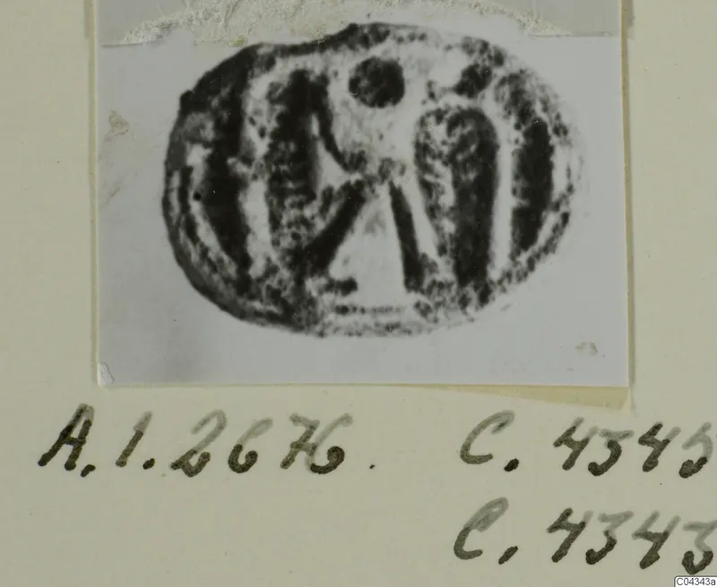 Oval seal or gem with an incised design, shown as a print pasted onto a card with handwritten numbers
