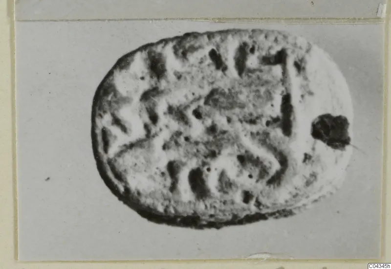 Scarab seal from Ayia Irini with incised signs on its flat base