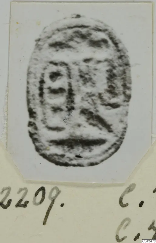 Oval engraved seal from Ayia Irini, photographed on a pale card mount