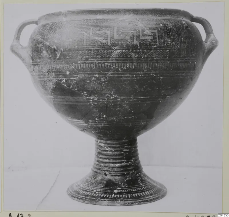 Pottery Special Wares: a footed vessel with two loop handles and bands of decoration around the body