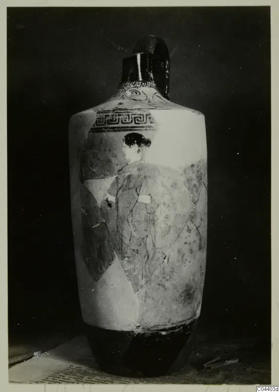 Tall pottery vessel with a loop handle, a painted figure in profile and a patterned band below the neck
