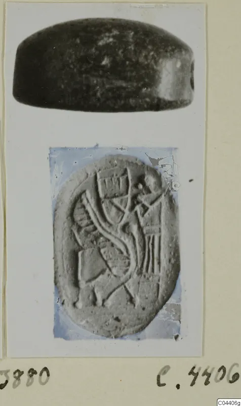 Two views of a dark stone seal, a side view of the object and an enlarged view of its carved oval face, from Ayia Irini