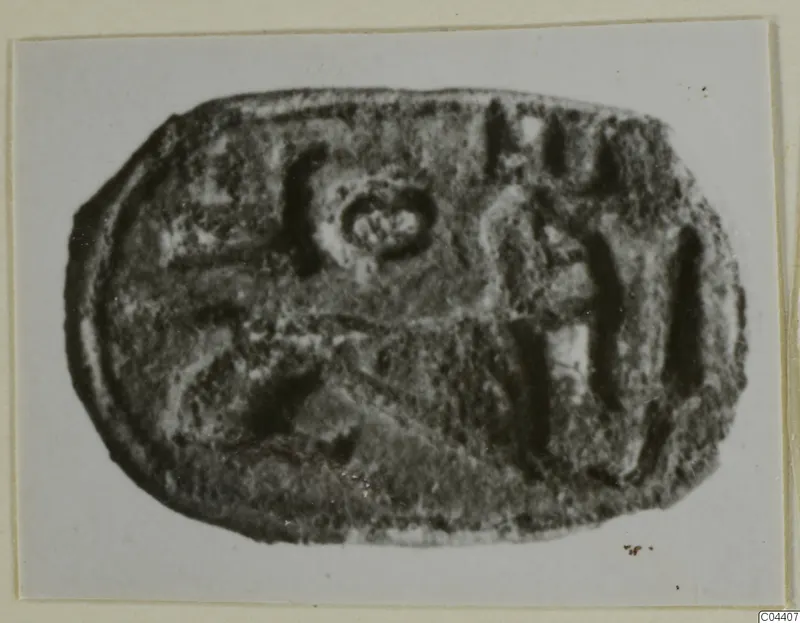 Engraved stone seal from Ayia Irini, photographed on a pale card mount