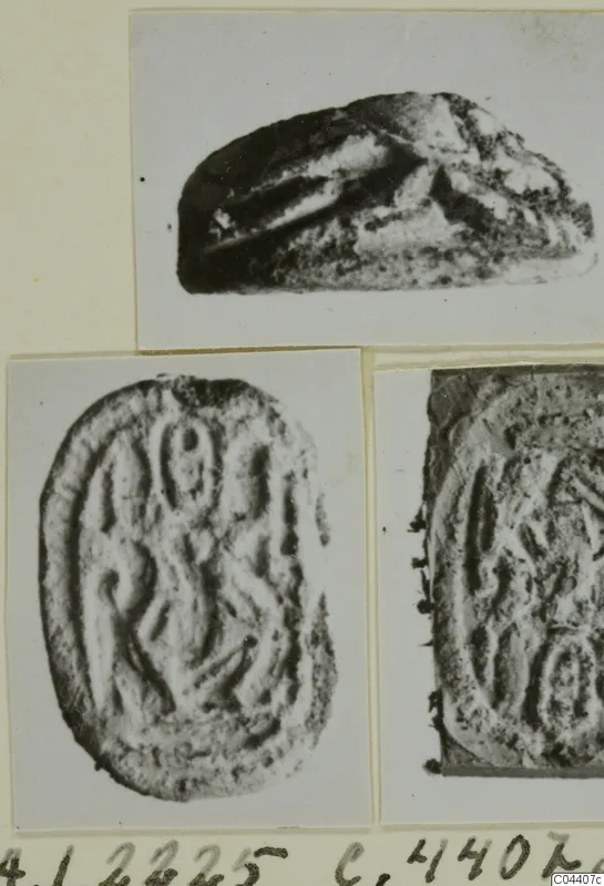 Three photographs of seal-stone finds: one scarab-shaped stone seen from the side and two incised oval faces