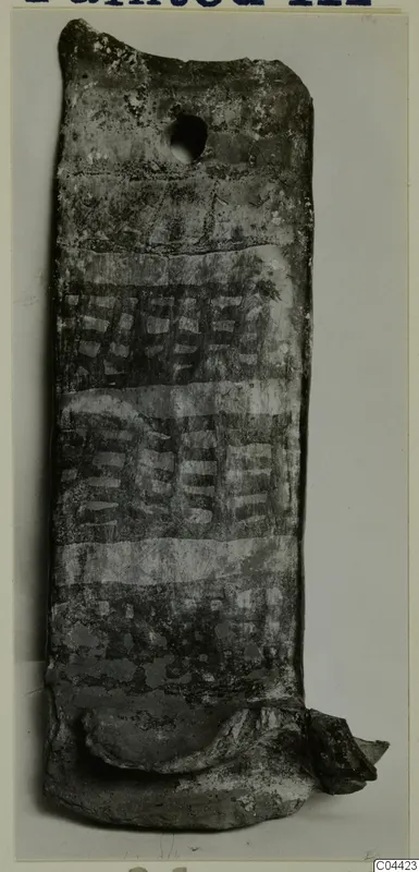 Pottery White Painted III-1 from Lapithos: tall pottery object with a hole near the top and white-painted bands and hatched motifs