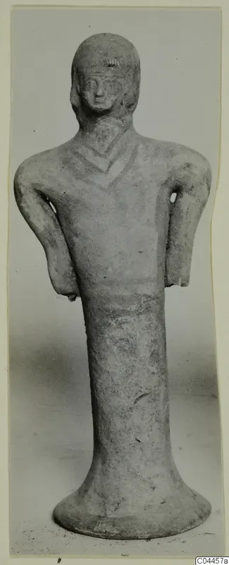 Terracotta figurine of a standing figure with bent arms and a chevron pattern across the chest