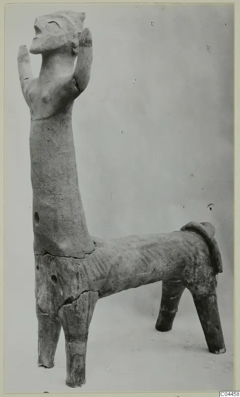 Terracotta figure with a human-like upper body and raised arms, set on a four-legged animal body