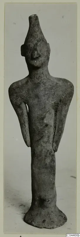 Terracotta figurine of a standing human figure from Ayia Irini