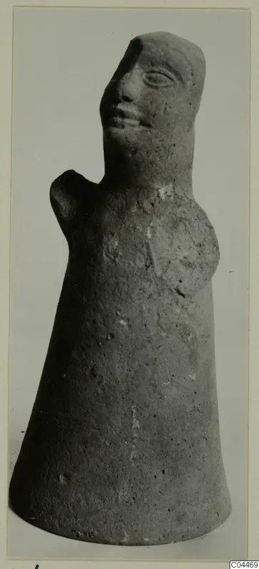 Terracotta figurine with a bell-shaped body and a face with eye, nose and mouth, from Ayia Irini