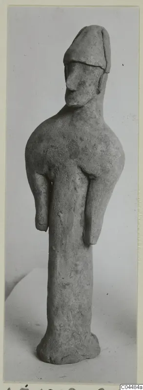 Terracotta figure from Ayia Irini with a cap-like head and short stubby arms.
