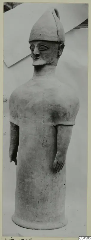 Terracotta Proto-Cypriote I standing figure from Ayia Irini, arms at sides, tall conical cap