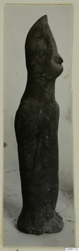 Terracotta figurine of a standing figure in side view, from Ayia Irini