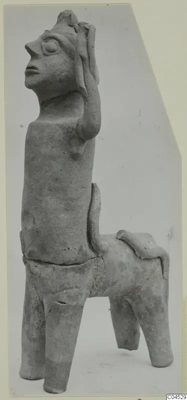 Terracotta figurine of a figure with a human-like head and a four-legged animal body, from Ayia Irini