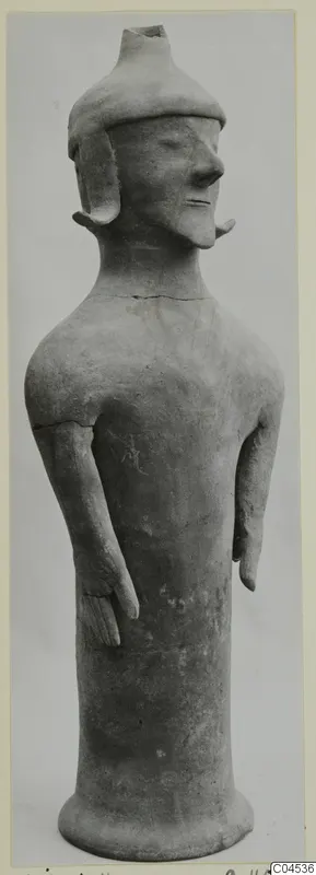 Terracotta figurine of a standing figure with a cap and moustache, from Ayia Irini