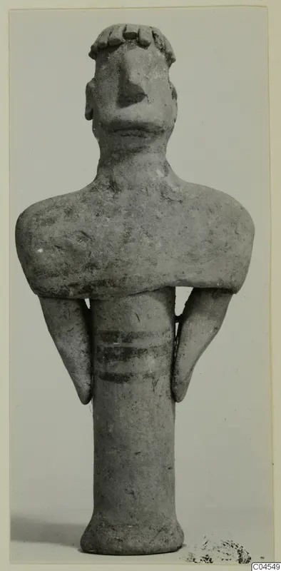Terracotta figurine of a standing figure with a broad head, arms held at the sides and three painted bands on the body.