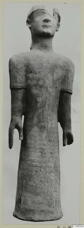 Terracotta Proto-Cypriote II, a standing figure with arms bent at the elbows and a long cylindrical body