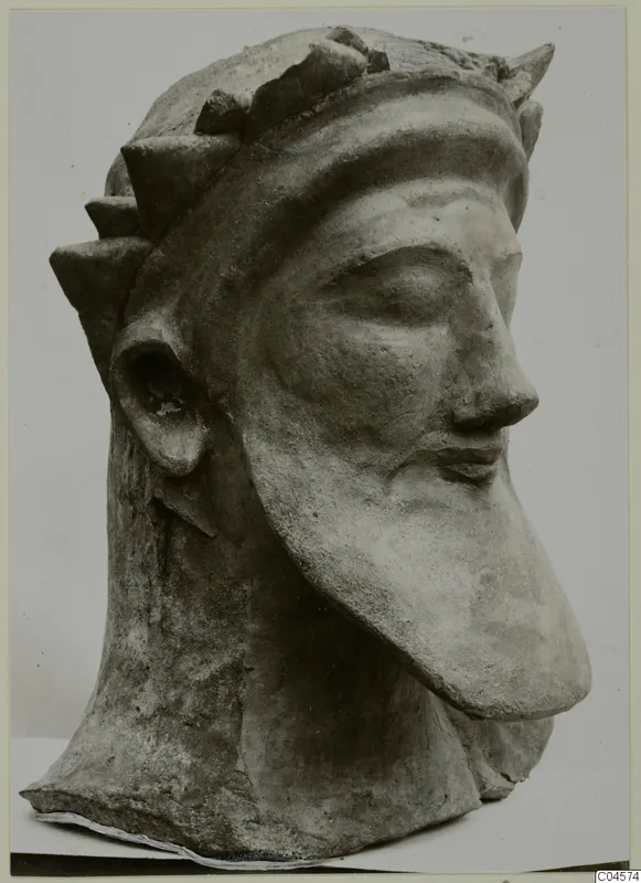 Bearded head sculpture from Mersinaki with a spiked headdress, shown in three-quarter view.