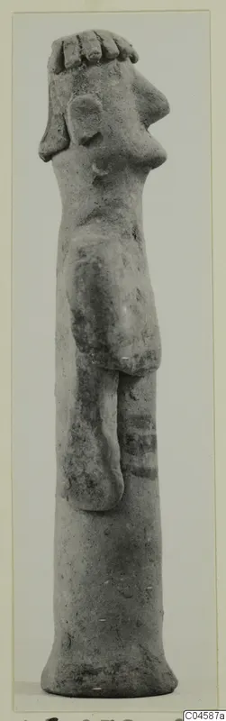 Terracotta figurine of a standing figure with a bent arm and a tall cylindrical base, seen in side profile.