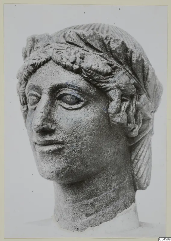 Limestone head from Arsos with a leafy band across the forehead and hair drawn back from the face
