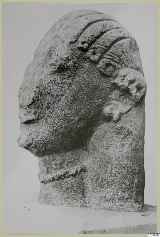 Limestone head sculpture in three-quarter view, with a raised hair band and rounded ear ornament