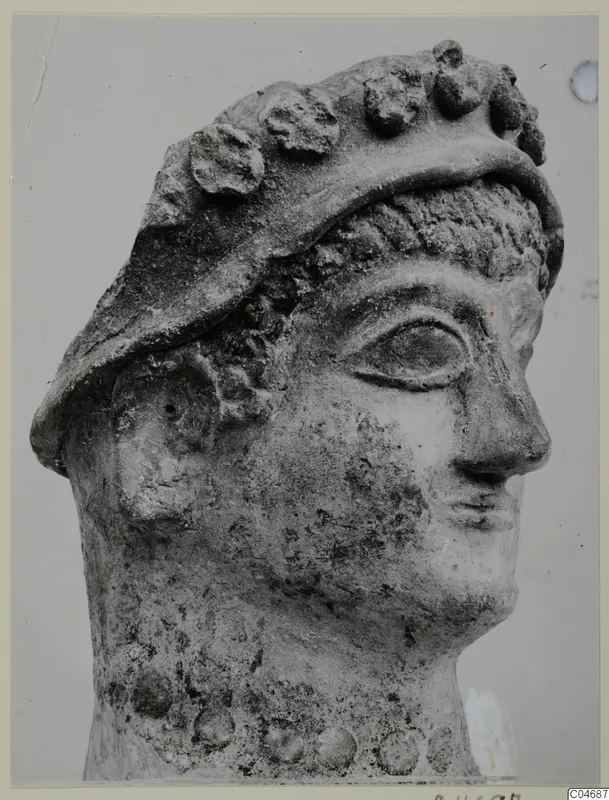 Head of a sculpture from Mersinaki, with a broad band of rounded knobs across the top of the head