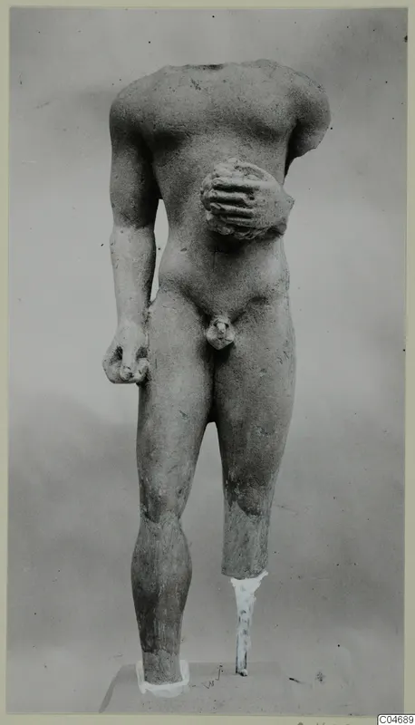 Limestone statue of a standing male nude, headless and with broken limbs, from Mersinaki.