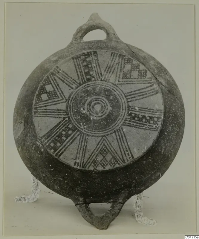 Pottery Black Slip Bichrome vessel with radiating bands and checkerboard panels, with loop handles, from Amathus tombs