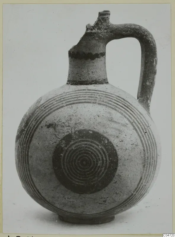Round-bodied jug with a tall neck, a strap handle and concentric painted rings, White Painted IV from Amathus
