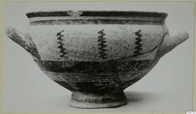 Pottery Bichrome III: a footed bowl with two horizontal handles and three dark zigzag motifs on its upper body